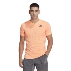 ADIDAS PERFORMANCE Aktion Noch Gültig Klicken Sie Auf Das Icon, Um Eine Erklärung Zu Erhalten. Adidas Tennis-Tshirt New York FreeLift Tee Orange Herren -Tennis Meister adidas HN9412 Tshirt New York203 1200x1200 1